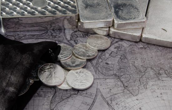 silver coins with silver bars silver coins with silver bars